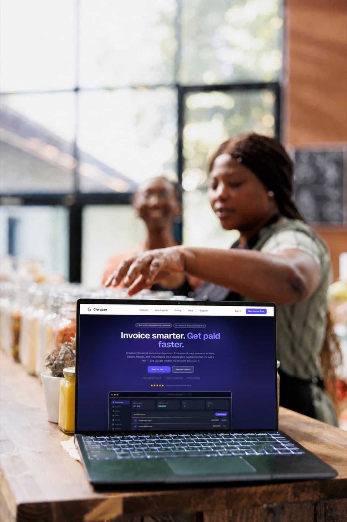Clerqpay invoicing software open on a laptop at a small business counter