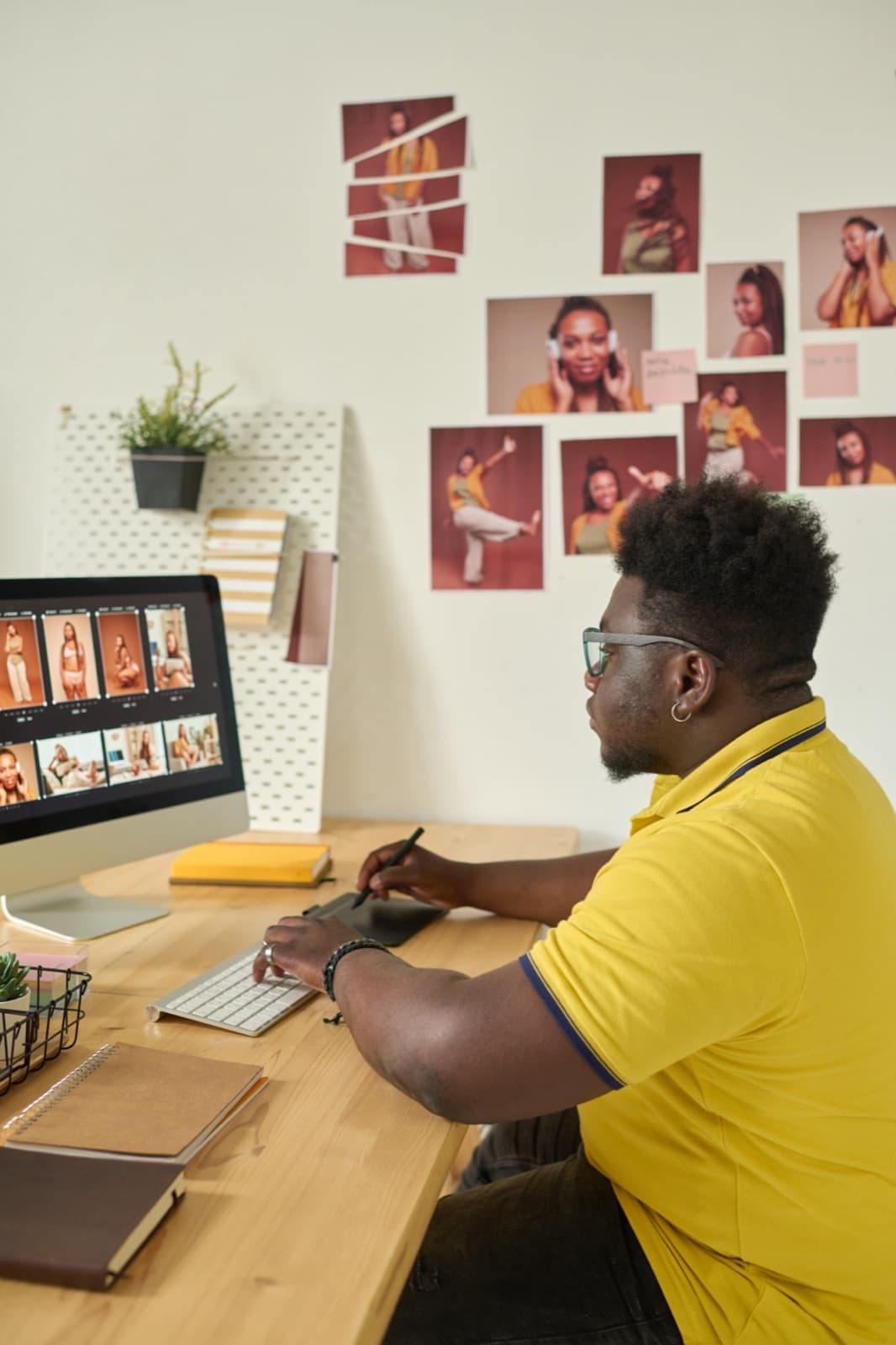 A freelance designer working on a graphics tablet